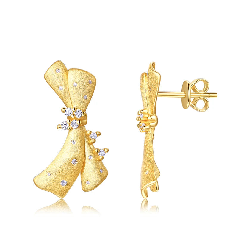 Juego de pendientes de plata con baño de oro 18k.