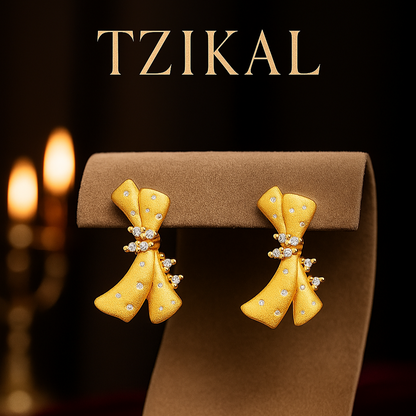 Juego de pendientes de plata con baño de oro 18k.