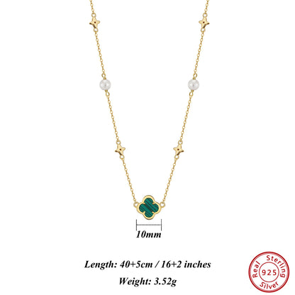 Gargantilla de plata de ley 925 con concha de perla y oro de 14 quilates con adorno de malaquita verde, estilo trébol de cuatro hojas