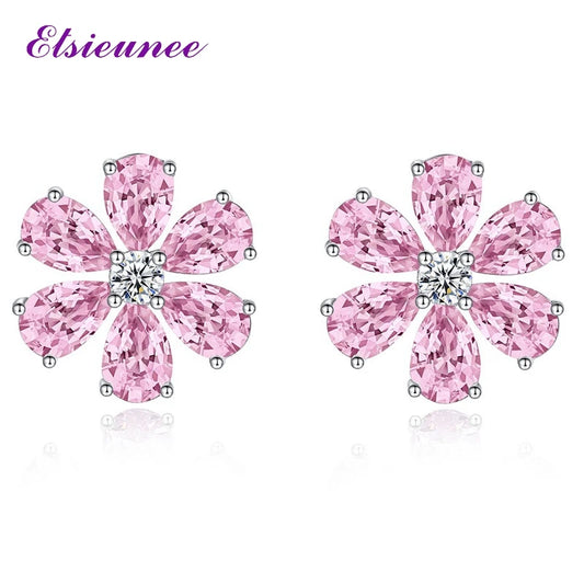 Aretes en diseño floral de plata con moissanita