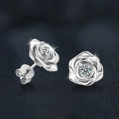 Juego de aretes diseño floral, plata con moissanita