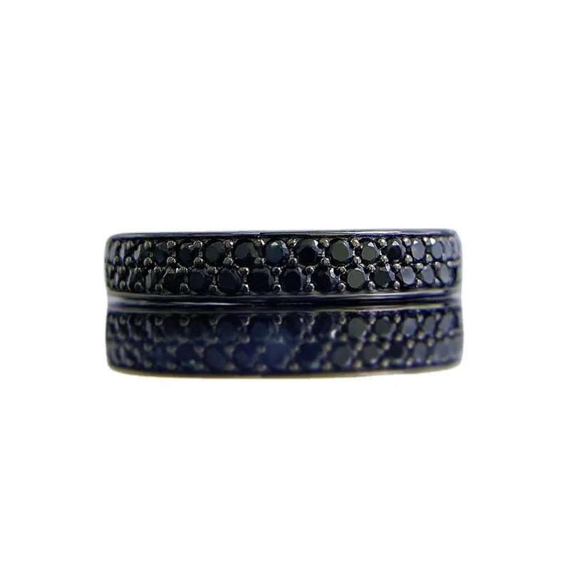 Anillo de plata con espinelas negras